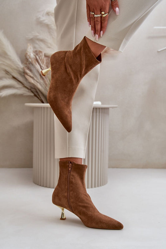 Heel boots Step in style